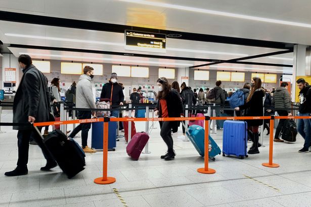 Security / check-in lines at Gatwick Airport as people travel