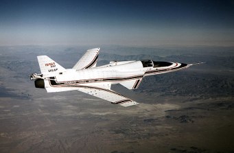 Grunman X-29 in flight over land. 