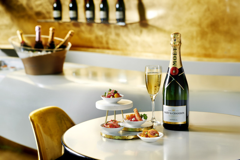 Moët Impérial Brut with four individual dishes, which are served throughout the month; Salmon tiradito on calamansi leche de tigre, Grilled Obsiblue shrimps, watermelon and feta salad, Tuna tartare with fresh orange segment, or Scallop tataki