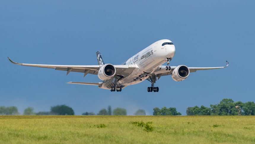 Airbus taking off against a blue sky