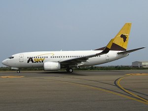 The image of Boeing 737-700 of ASKY Airlines at Kotoka International Airport.