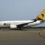 The image of Boeing 737-700 of ASKY Airlines at Kotoka International Airport.