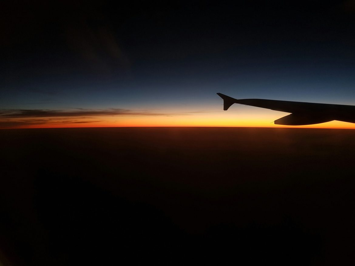 Sunrise view from airplane flight