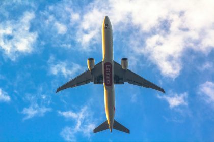 View of Emirates plane flying above