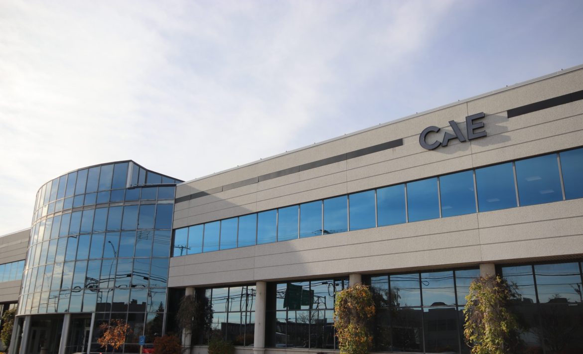 An office building with the letters CAE