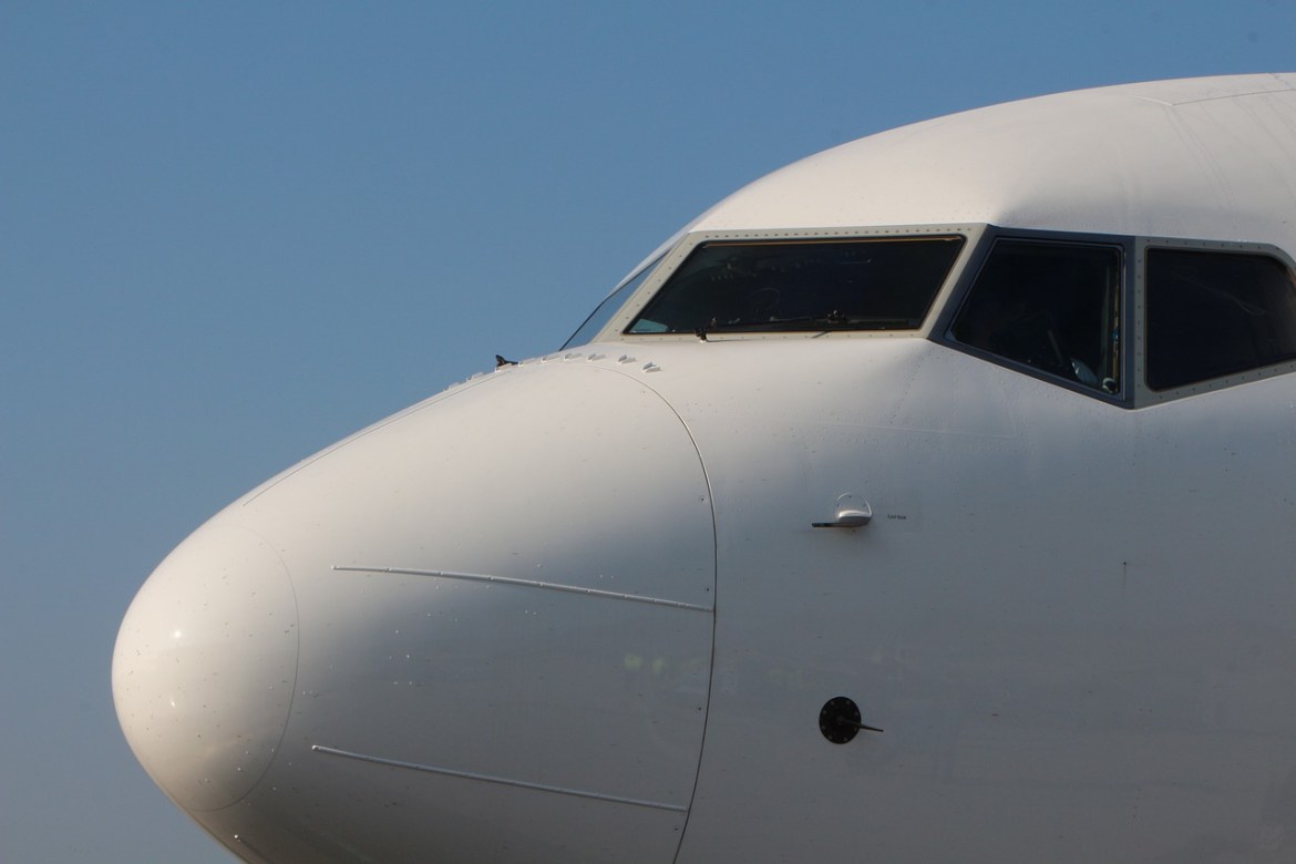 The image of a nose of a plane.