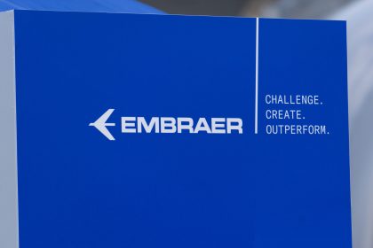 Blue Embraer logo and slogan