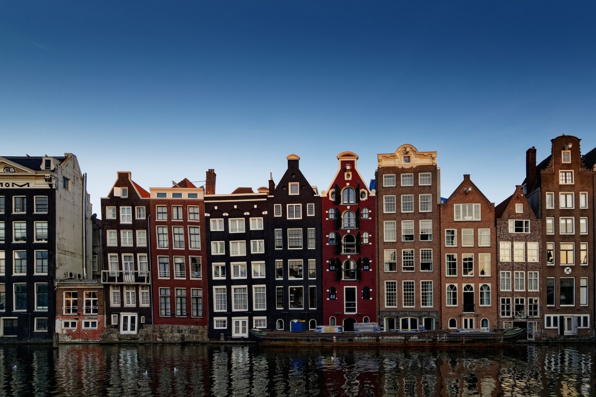 Row of Amsterdam houses on the canal