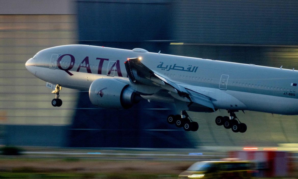 A Qatar aircraft taking off from a runway