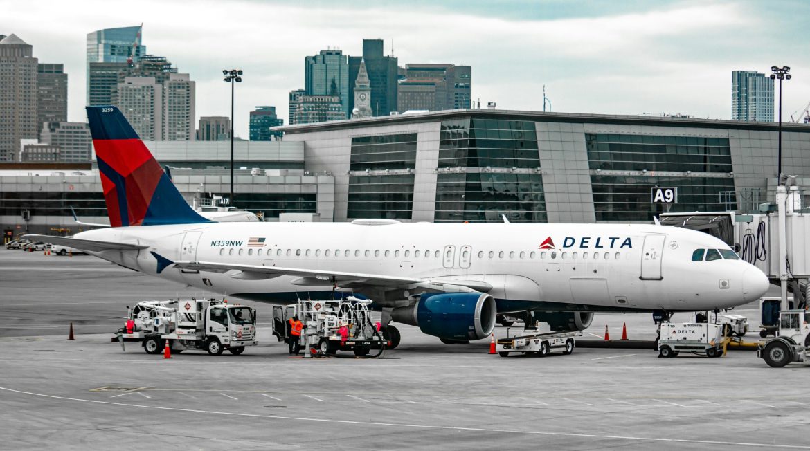 White Delta Air Lines Plane on the runway 