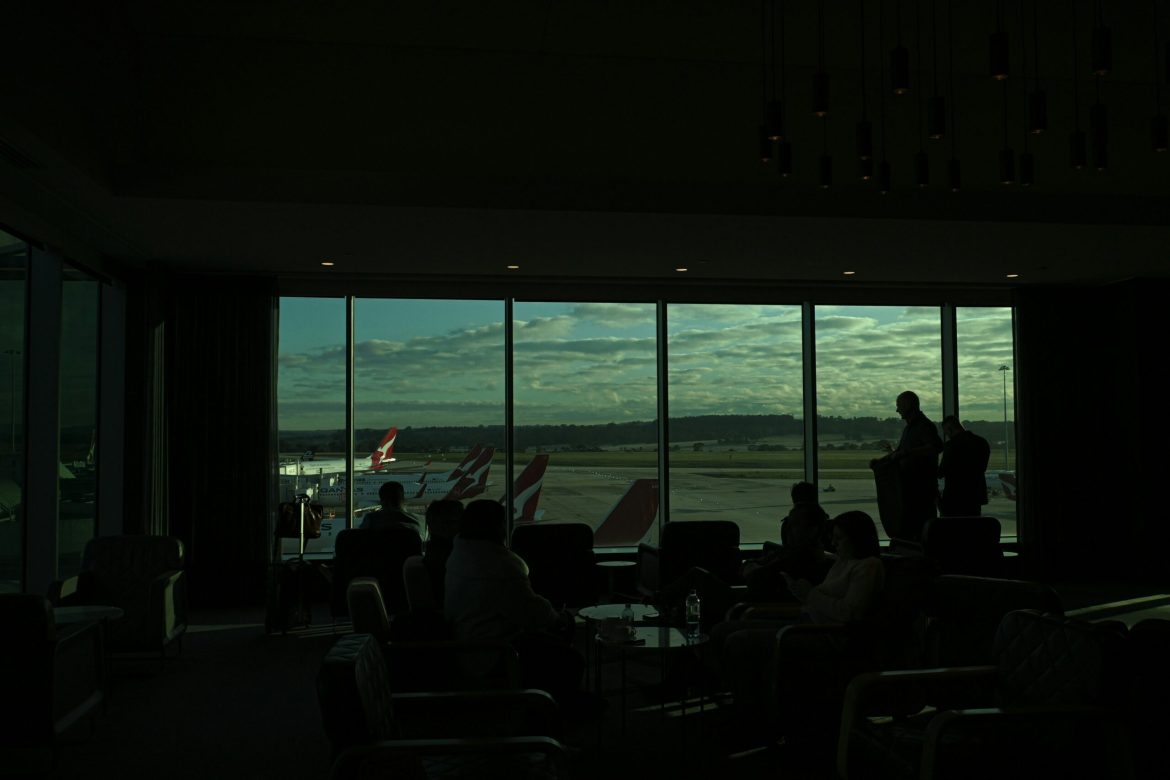 Passengers waiting for a flight at Sydney Kingsford Smith Airport 