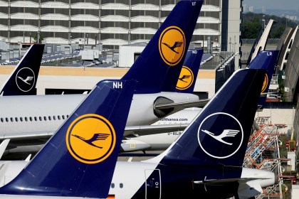 Four Lufthansa planes in a row signalling the aircraft will continue to operate and will not be overcome by strikes