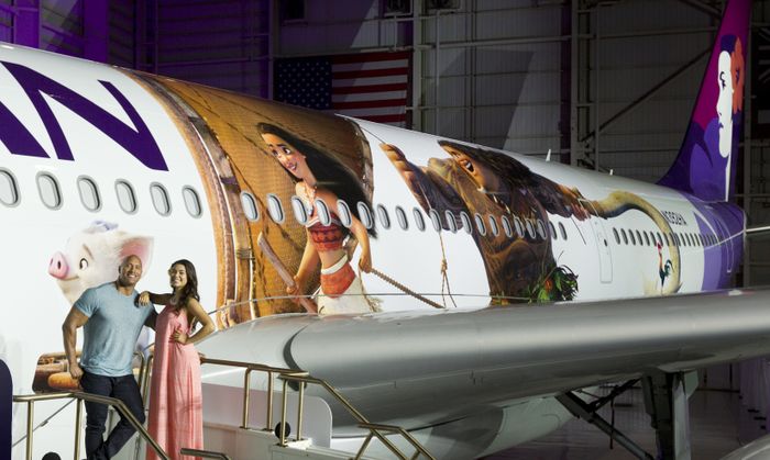 The image of voice voice actors next to thematic 'Moana 2' plane.