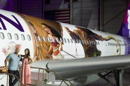 The image of voice voice actors next to thematic 'Moana 2' plane.