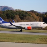 Image of Scandinavian Airliner SAS landing on the runway of Sola Airport